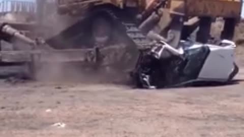 Dozer Crushes Car With Ease