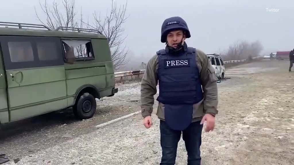 Press on the scene showing damage from explosions in the Donetsk region