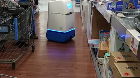 Big Box Store Robot Roams the Aisle