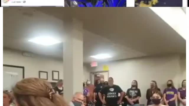 Angry parent at a school board meeting