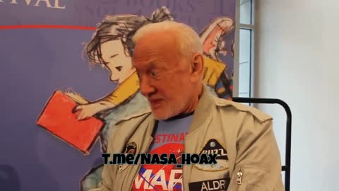 Buzz Aldrin being interviewed by a kid