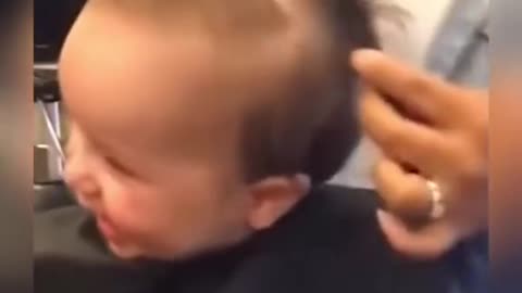 The joy of baby cutting hair