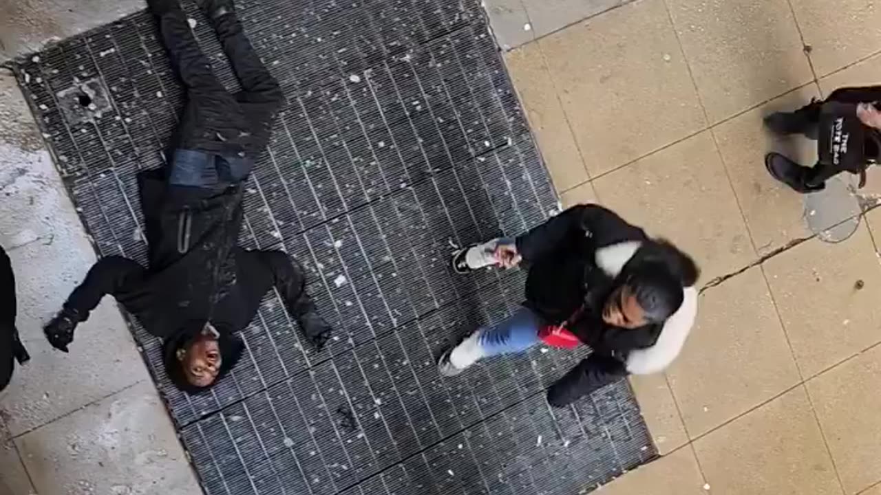 Busy daylight shooting at Madison and Wabash in Chicago captured on video.