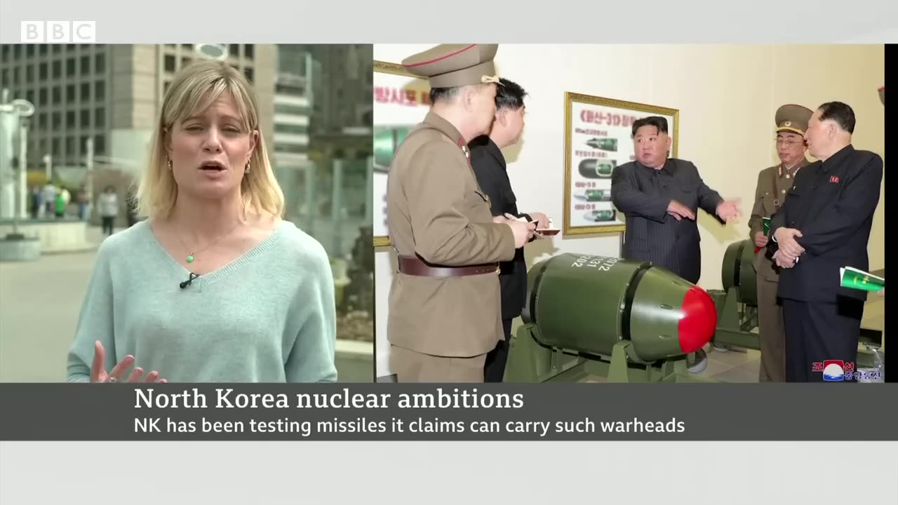 North Korea publishes photos of 'small nuclear warheads'