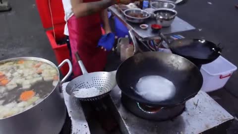 The cook greased the pan before frying the vegetables.