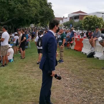 22 January 2022 channel 9 reporter with face ask Musgrave Park Brisbane Australia.