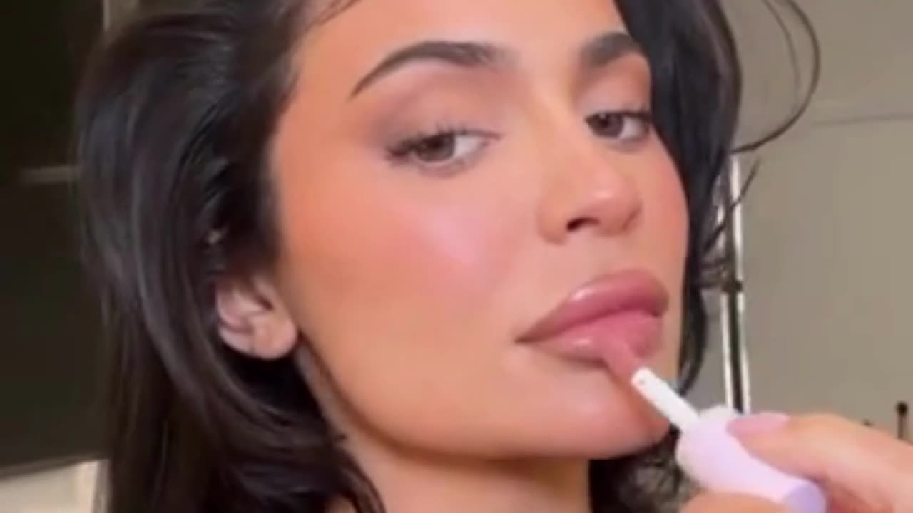 Kylie Jenner flaunts her famous pout while promoting her makeup