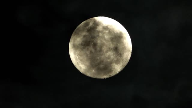 Watch how the moon changes color, it's very strange shots