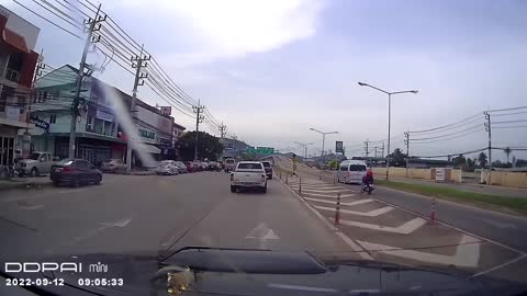 Motorcyclist Bumps Into Van