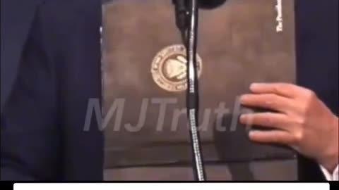 President Trump Holding Renewed Presidential Seal