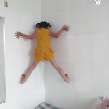 Girl climbs a wall!