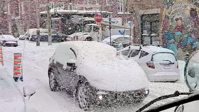 Car Completely Covered in Snow Goes for a Drive