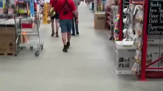 A Guy Walks Through Bunnings With A Megaphone Singing ~