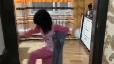 A beby girl trying a magic