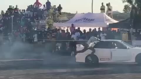 instant regret- jumping out of a car while it's doing a skid