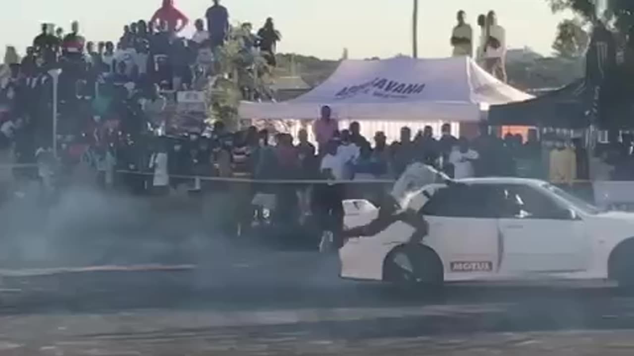 instant regret- jumping out of a car while it's doing a skid