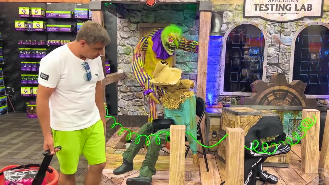 Dad decorates the house for Halloween for Nastya