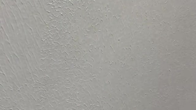 All the prisoners in the warehouse turned their heads towards the door.