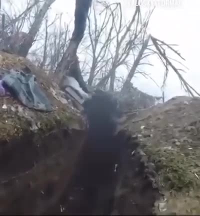 Ukrainians Clear a Russian Dugout