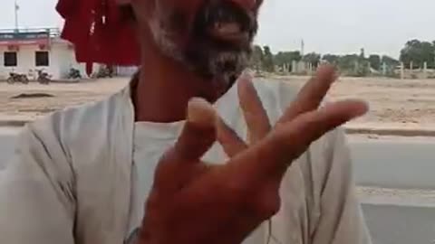 VILLAGE MAN SPEAKING ENGLISH