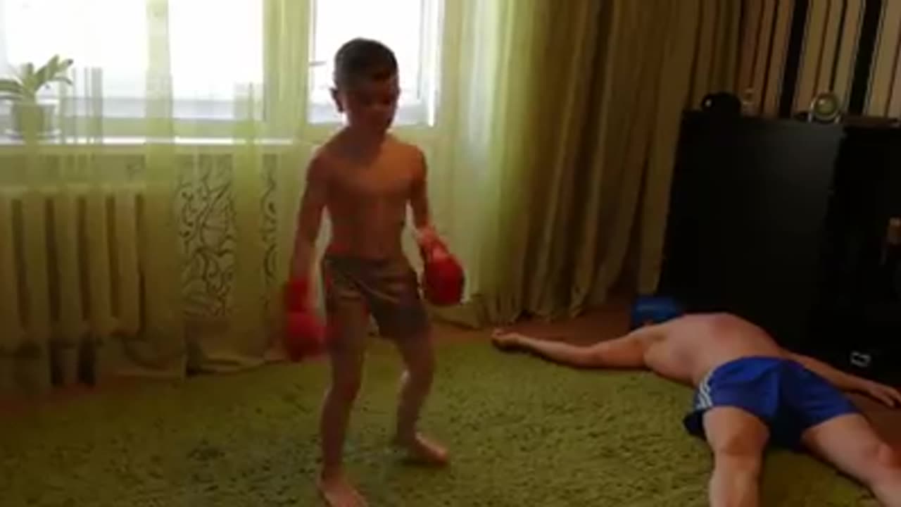 Small boxing with her dad