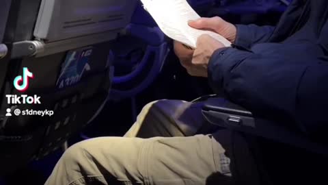 Guy on Flight Rips Pages From Book After Reading Them