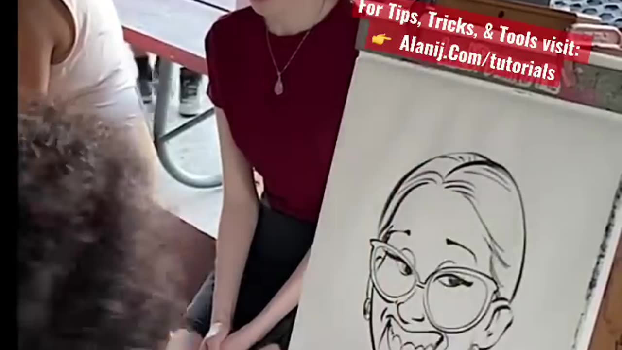 Super shy young lady gets caricature drawn by Alani J