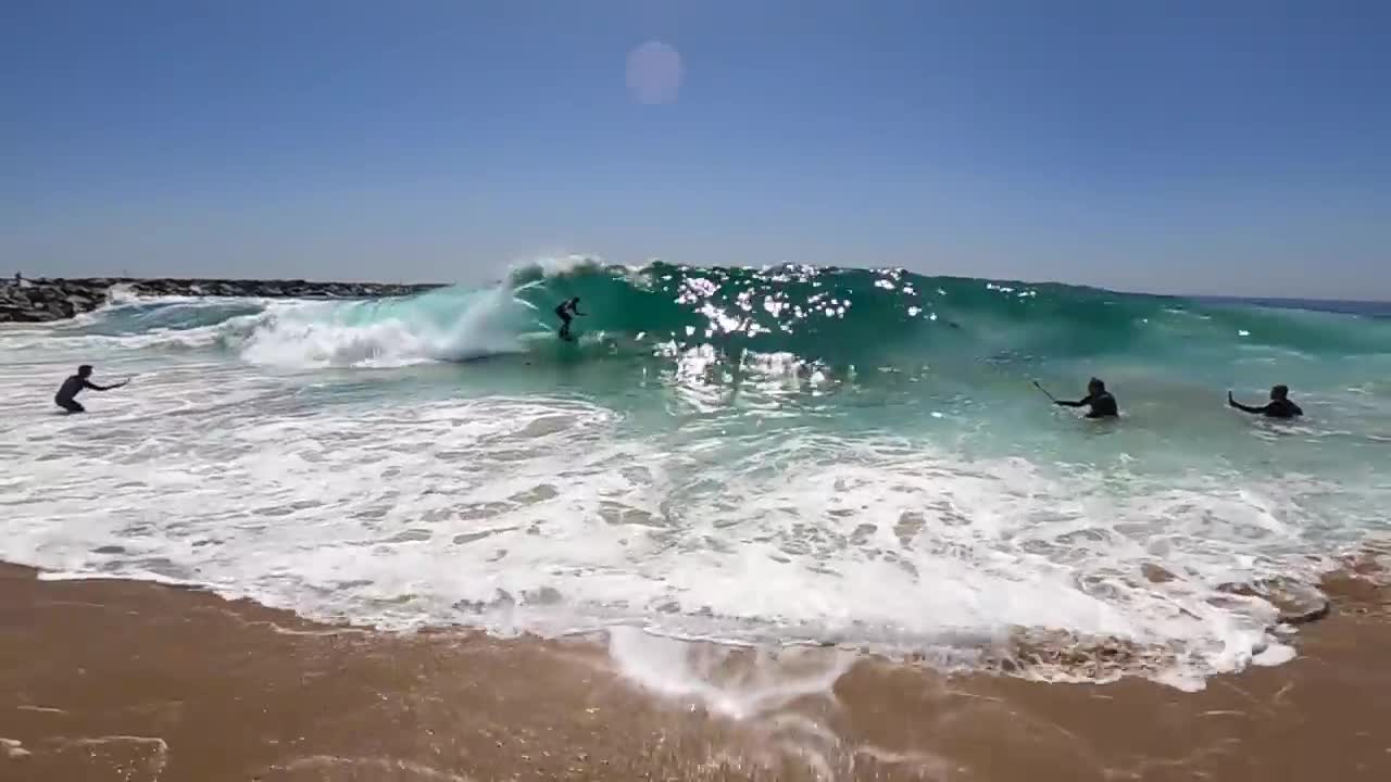 Surfing and Skimboarding WEDGE on massive HIGH TIDE