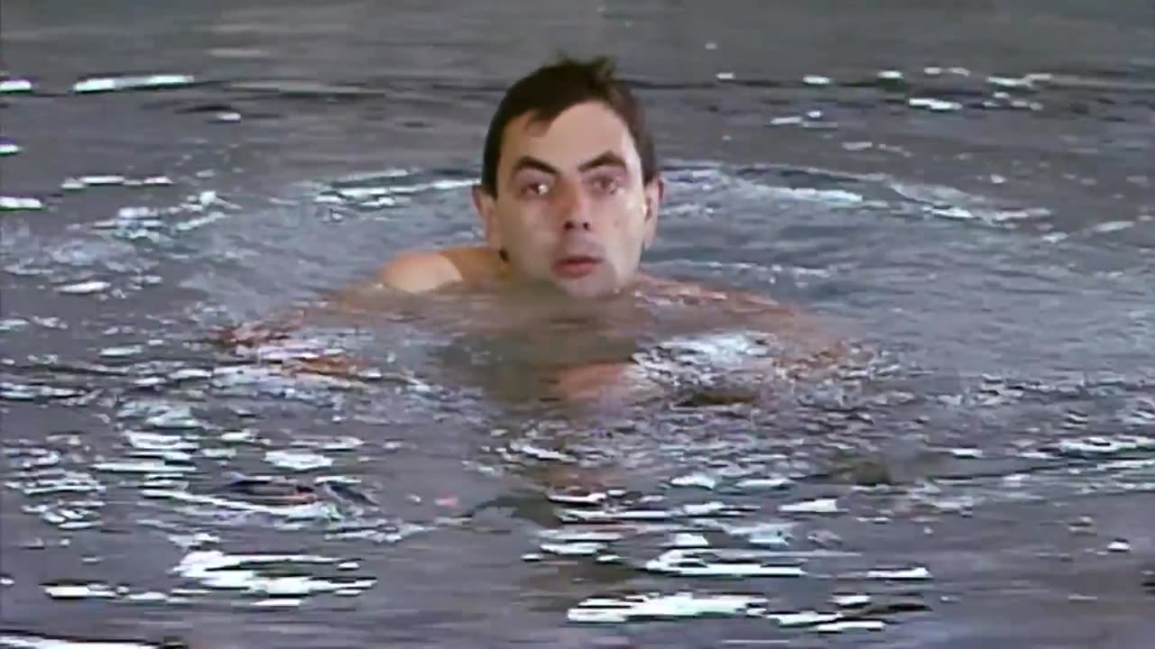 Mr Bean goes swimming and tries to attempt the diving board!