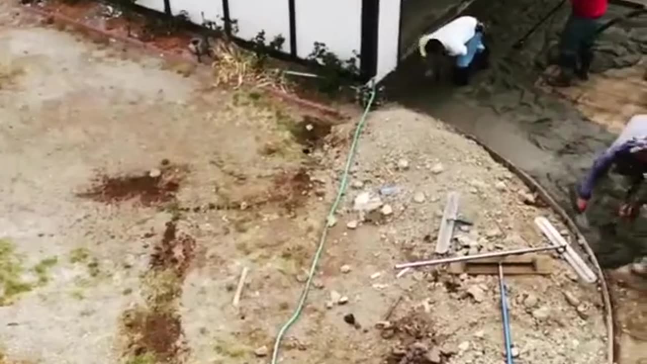 Aerial view of Pouring Concrete on the Driveway