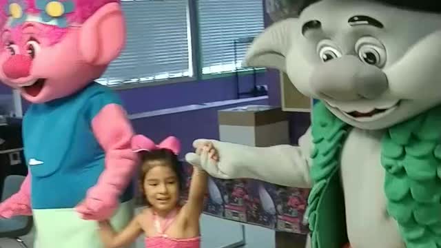 Trolls dance with new pal at a birthday party in Pasadena Texas