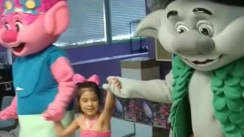 Trolls dance with new pal at a birthday party in Pasadena Texas