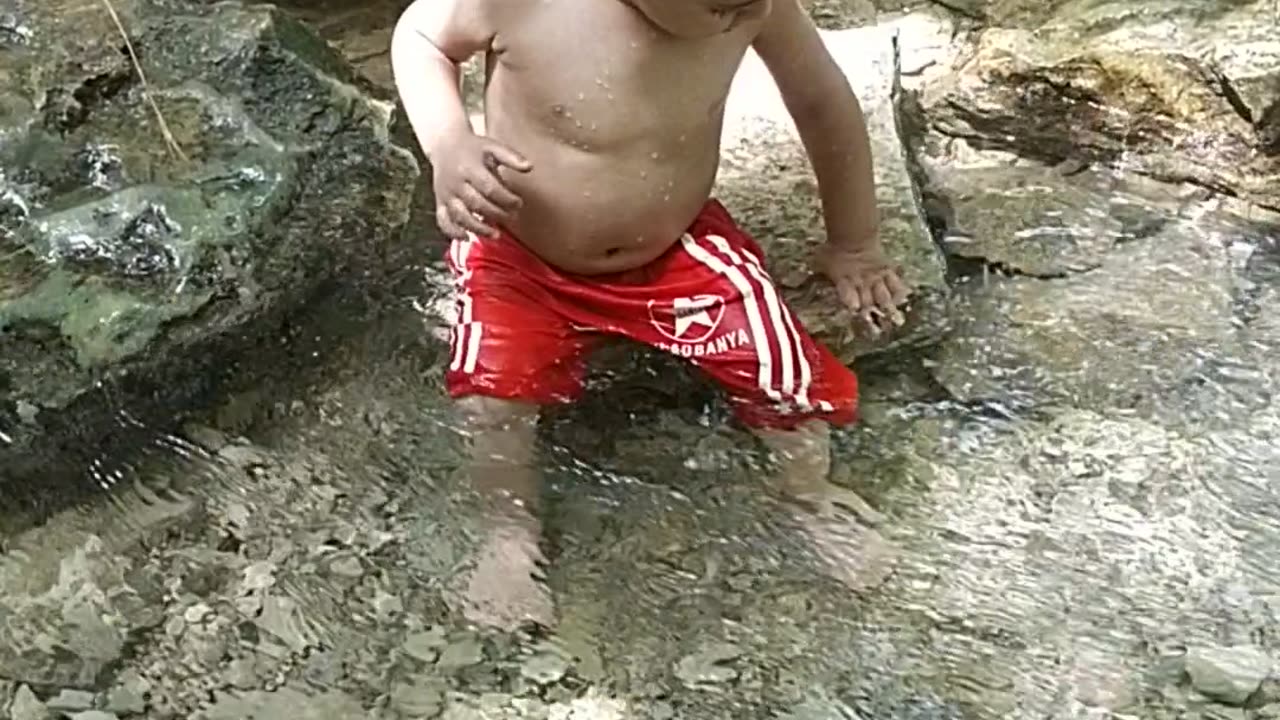 My son enjoy the water