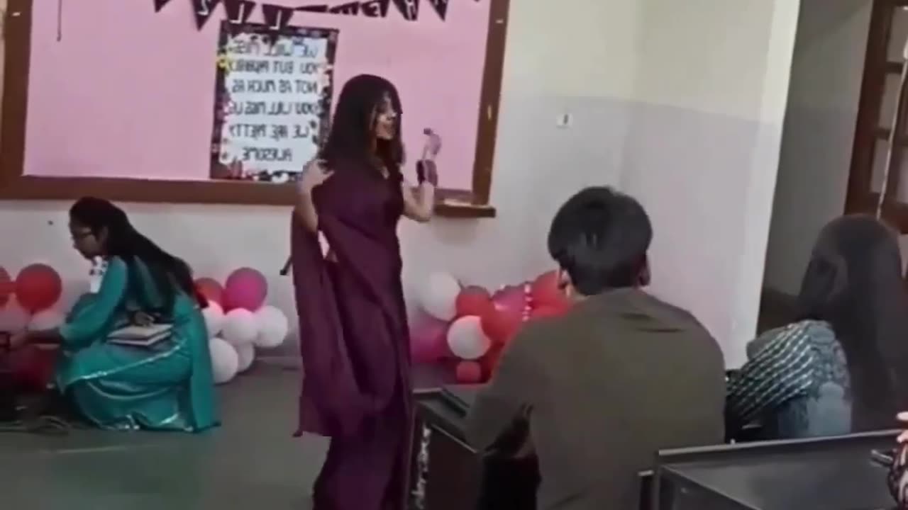 A beautiful hot ladies teacher dance in the school