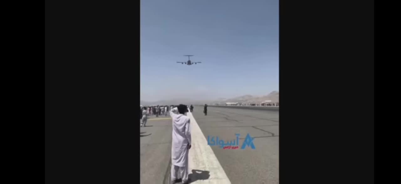 Afghans Cling to C-17 and Fall To Their Death On Takeoff