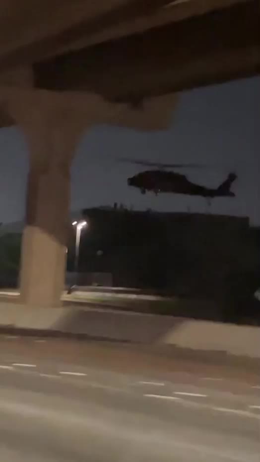 Two Blackhawks apparently using IR just landed in a parking lot off a major freeway