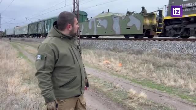 The Russian armored train "Amur" is on its way somewhere, checking out a stretch of road.