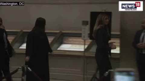 Melania Trump makes rare public appearance at National Archives naturalization event.