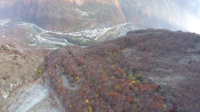 BASE Jumper Crash Lands and Waits for Rescue by Helicopter