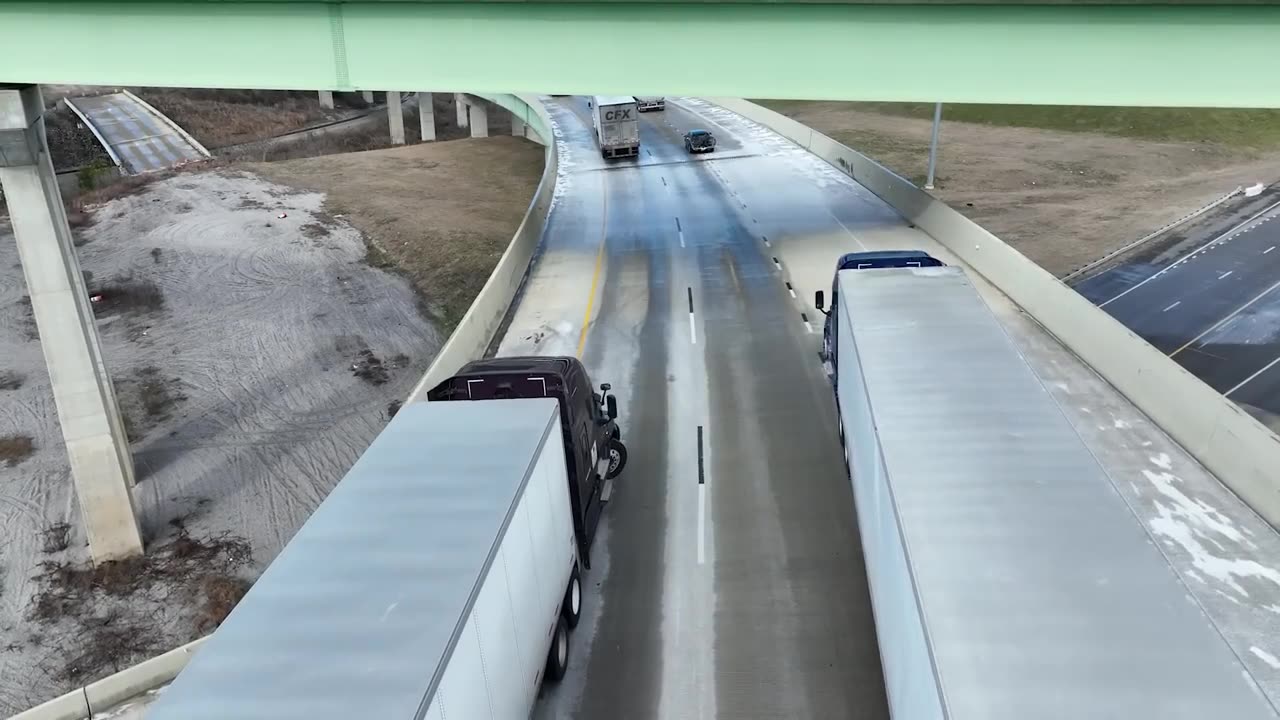 Semi's Sliding Sideways into Each Other on Icy Ramp