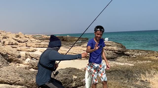 Happy Fisherman: Emperor Fish Caught from Shore