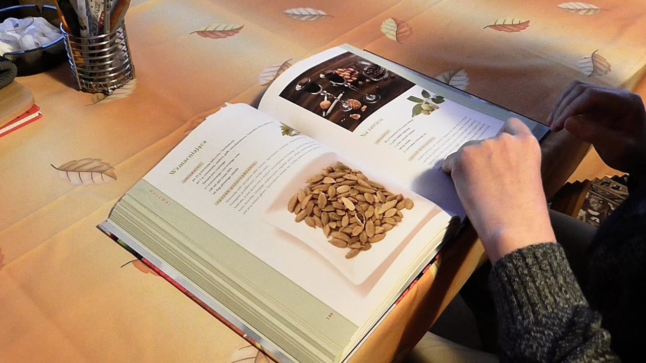 Girl watching pictures on her book