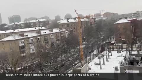 Russian missiles plunge Ukrainian cities into darkness