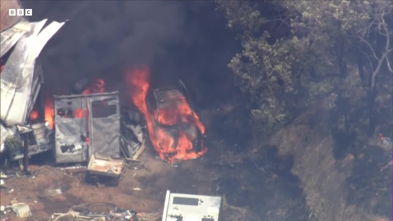 Australia- Moment house collapses in Perth wildfire