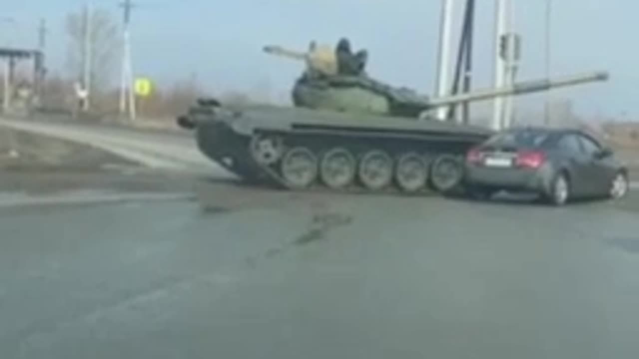 Old Tank Crashes into Civilian Car Somewhere in Russia