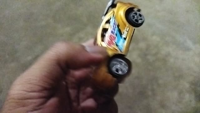 yellow car 46 racing