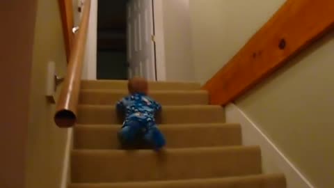 *whoah* smart baby sliding down the stairs!!