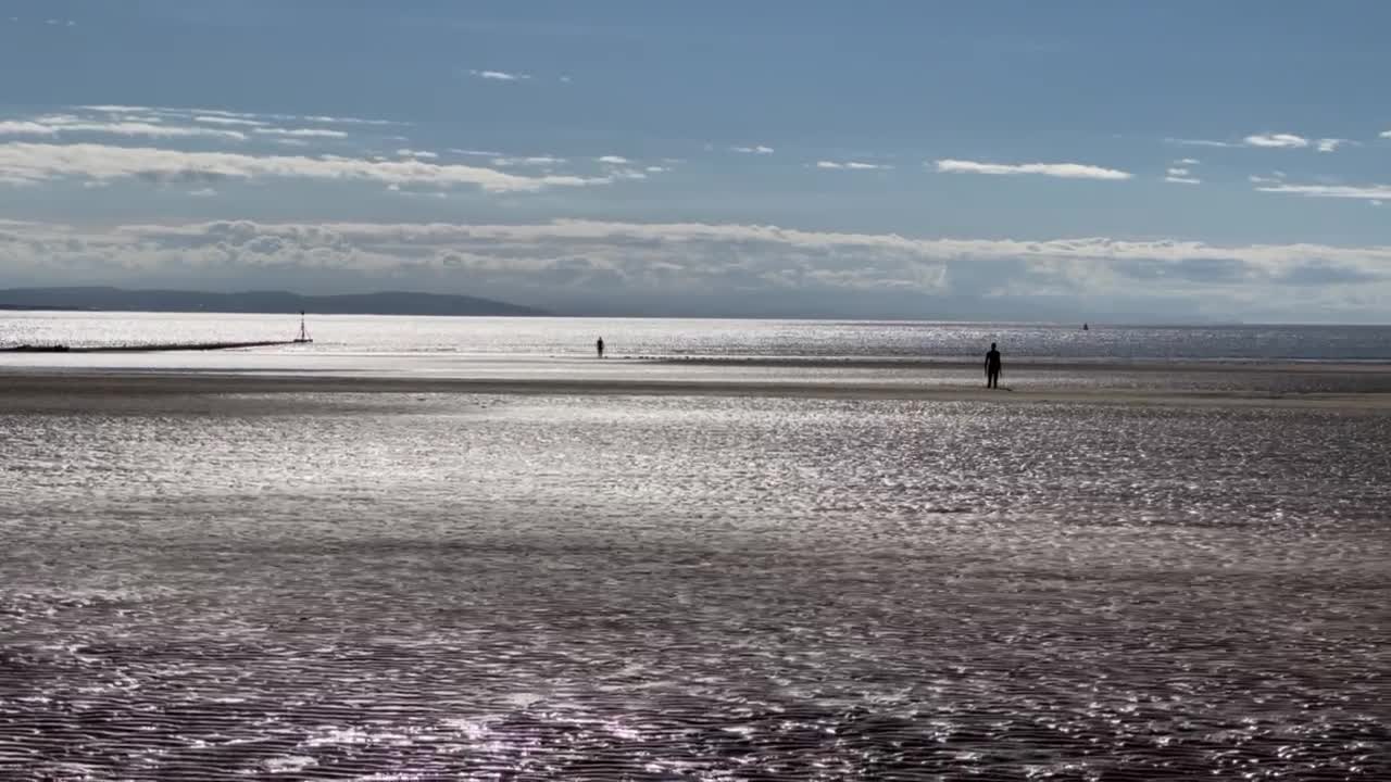 Walking along Crosby beach, Waterloo