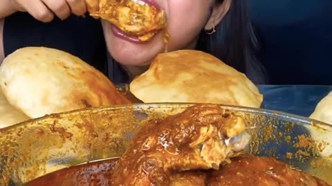 Chicken curry with Puri eating