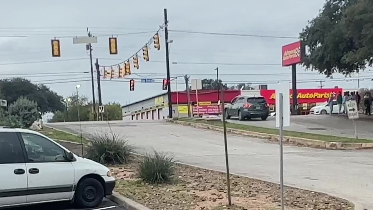 Illegals swarm a shopping center across the street is an everyday event !